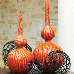 Image of orange home accessories by Global Views available at Ross Furniture